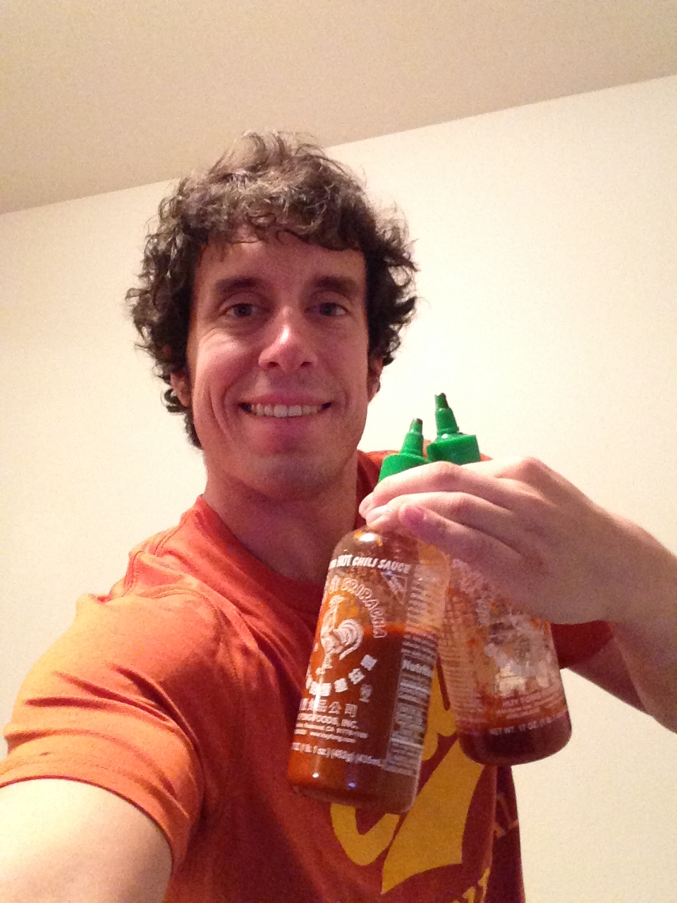 Myself with my one and only condiment, Sriracha