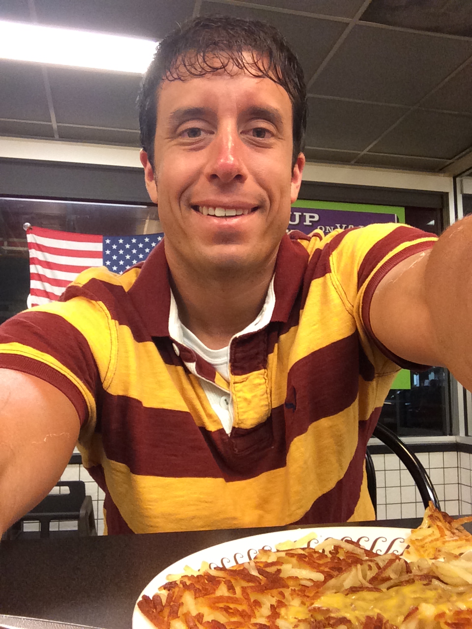 Me enjoying my experience at Waffle House.