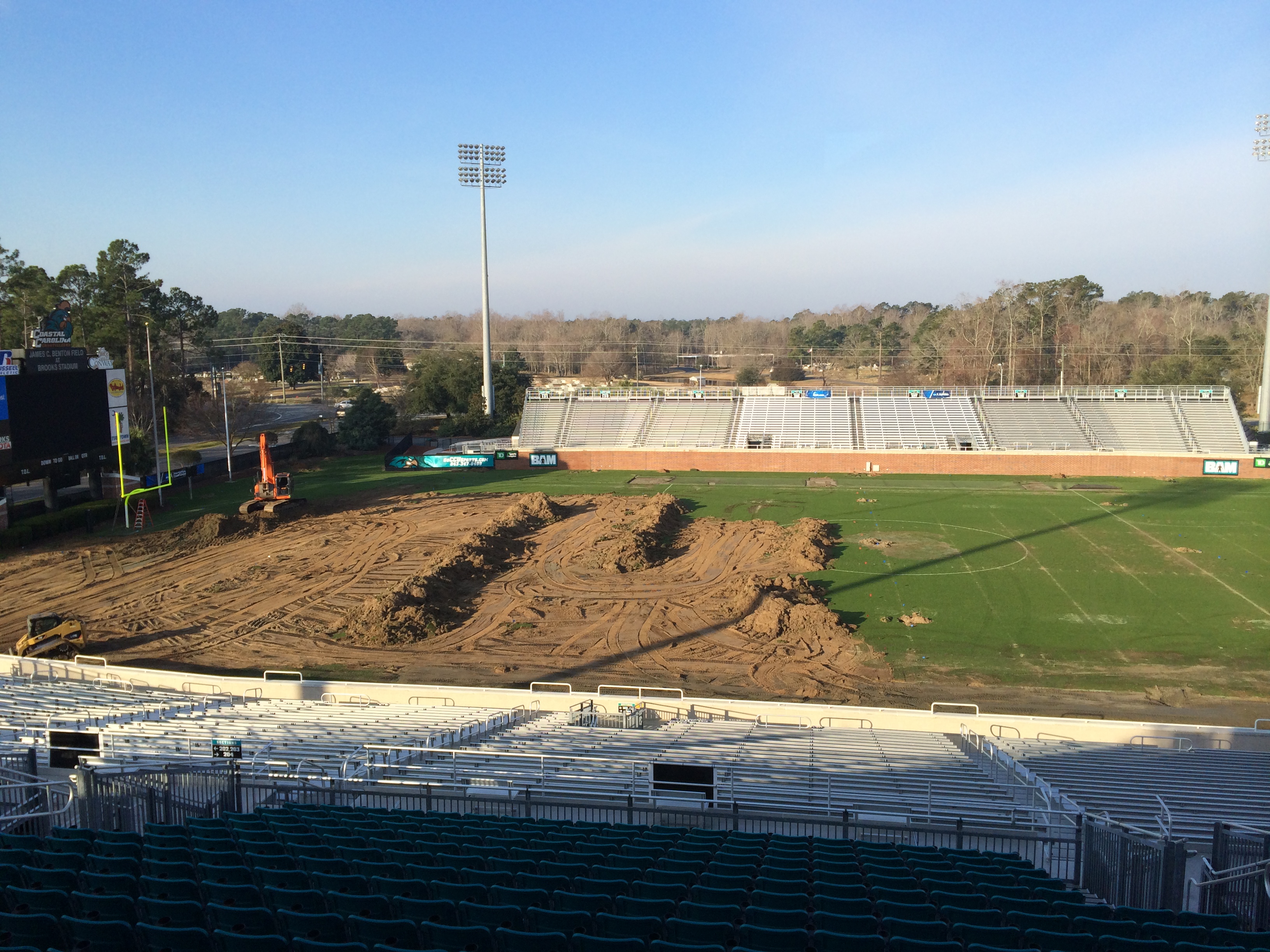 The removal of the grass playing surface is underway at Brooks Stadium.