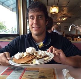This is me with a plate of banana pecan pancakes in a Myrtle Beach restaurant.