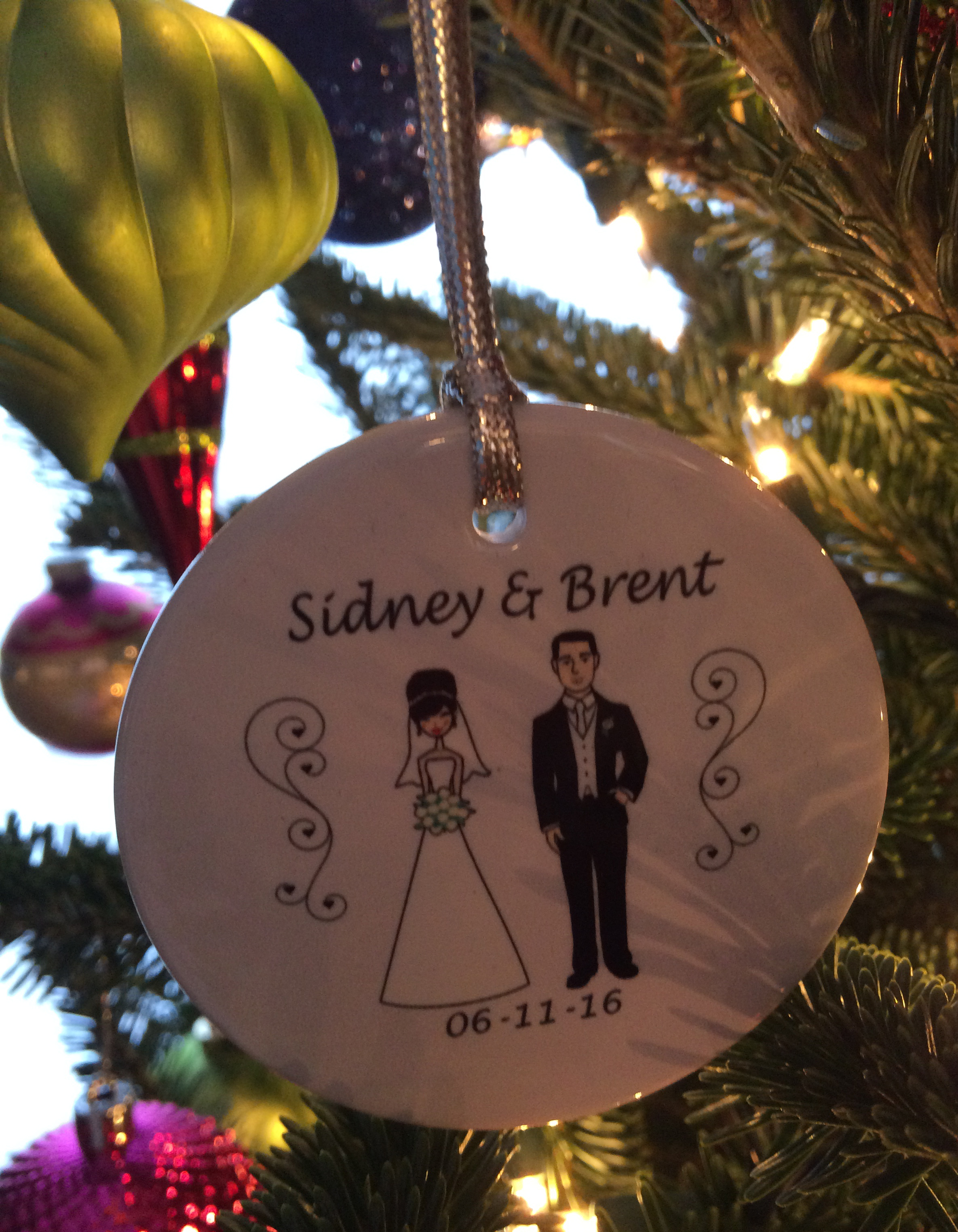 Our sponsor couple, Tim and Kathy McCormick, gave us this ornament as part of the wedding gift they graciously gave us.