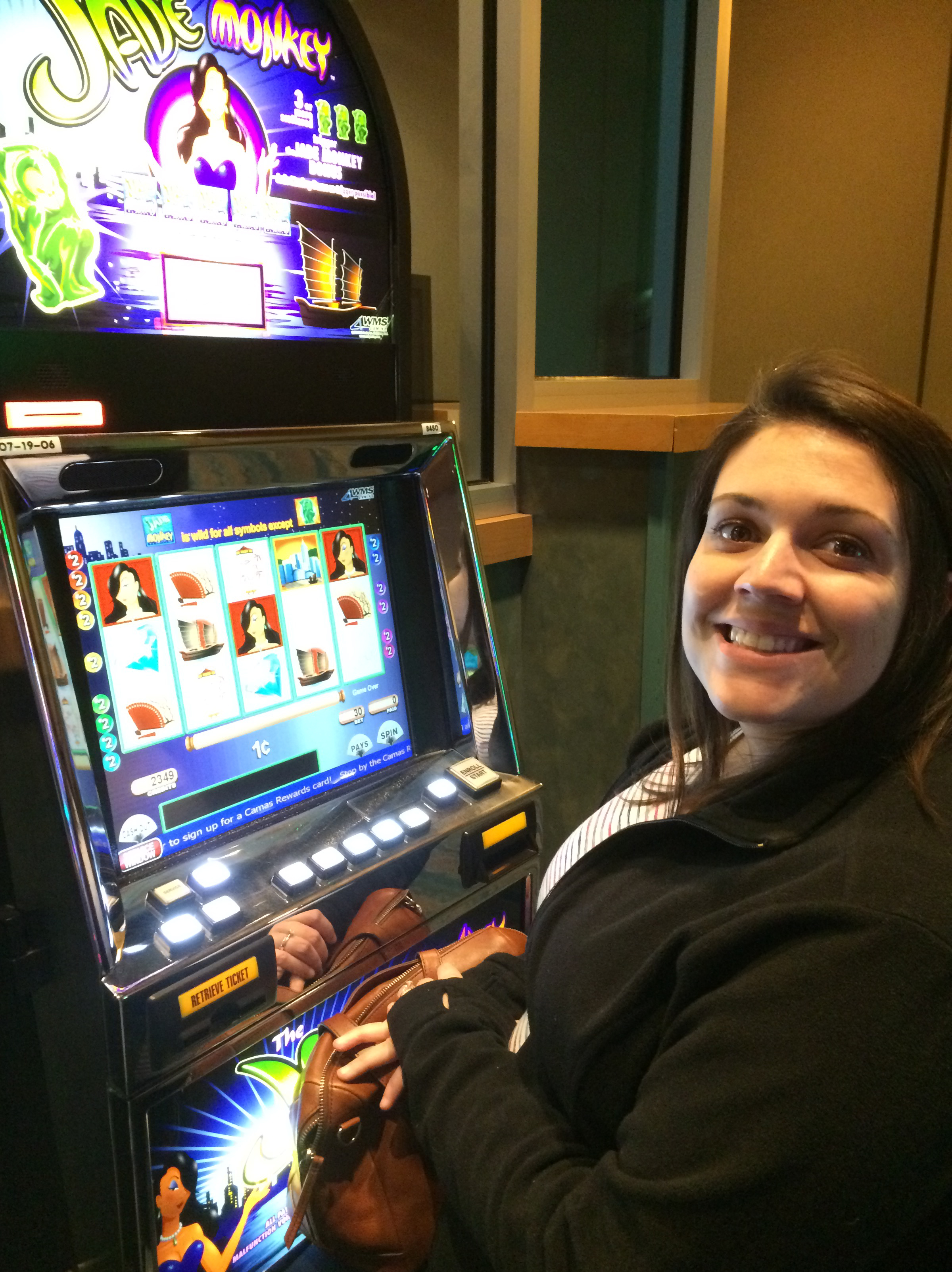 Sidney winning money at the slot machine at Northern Quest.