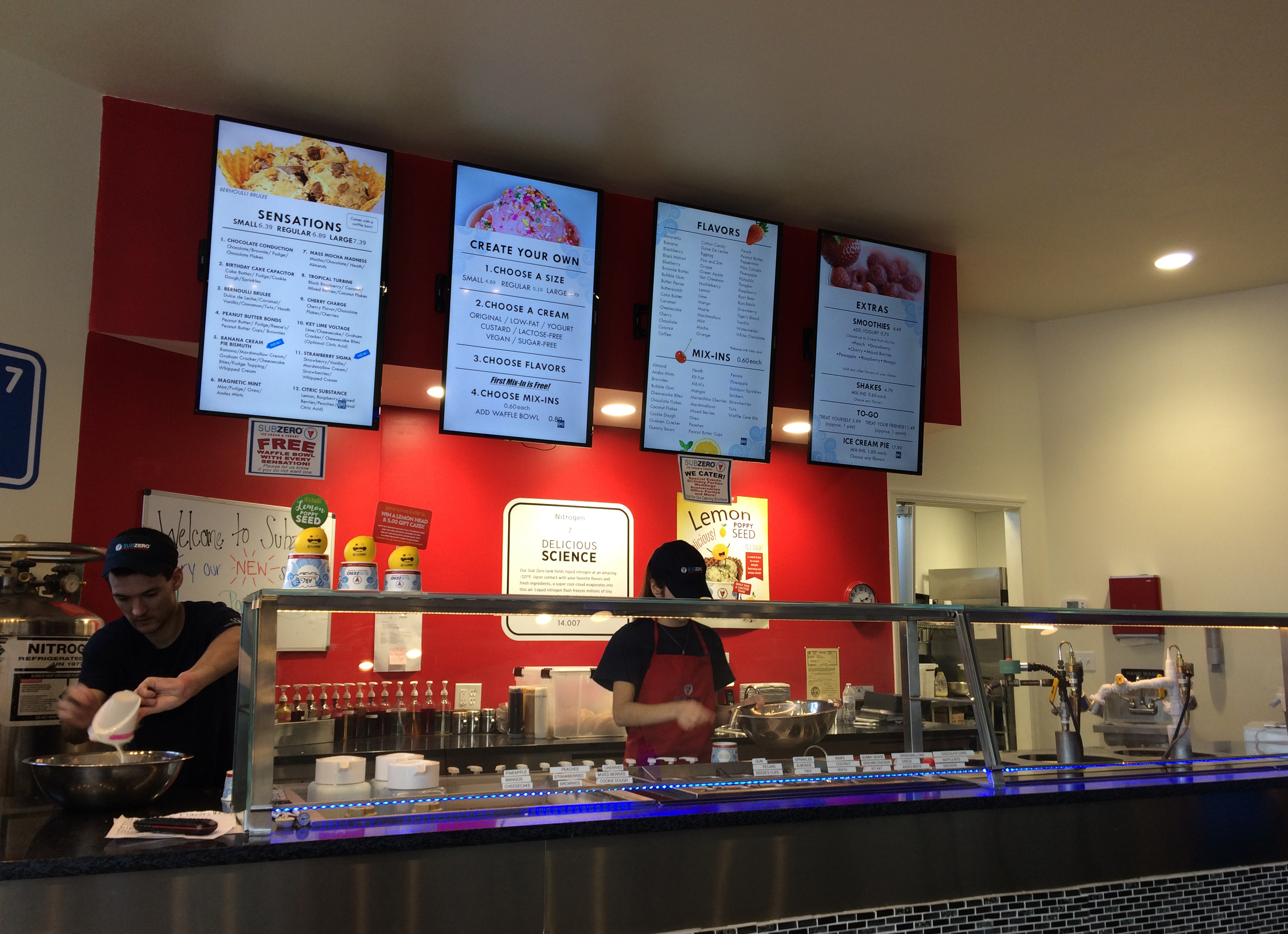 A look at the set up behind the counter at the Myrtle Beach Sub Zero Ice Cream location. If you look to the left, you can see the staff member pouring the cream into the silver bowl.